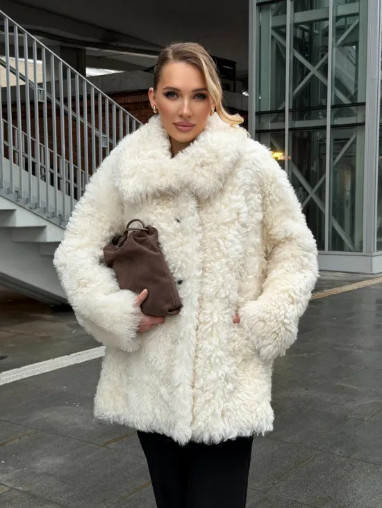 Белая шубка из тиградо - фото 17